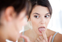 На языке прыщик болит: что делать, как лечить и почему он возник