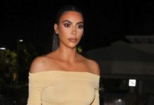 В ботфортах и обтягивающем платье: новый выход Ким Кардашьян