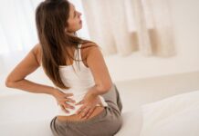 Почему возникает боль в пояснице