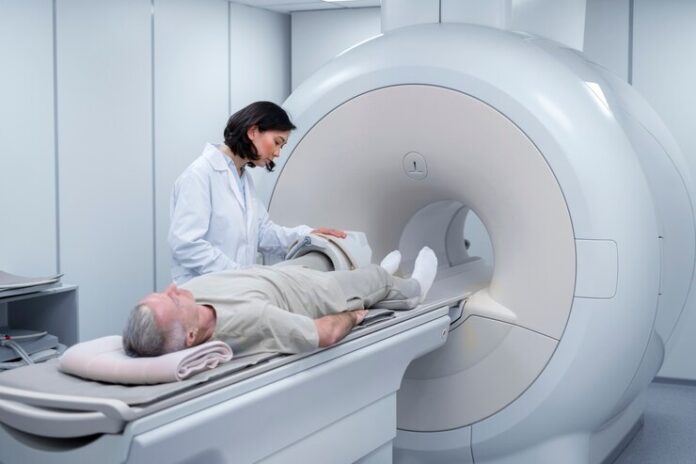 doctor-getting-patient-ready-ct-scan_23-2149367457