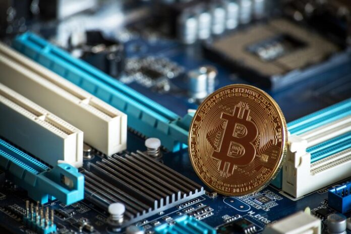bitcoin-logo-coin-computer-parts-cryptocurrency-concept_1048944-10791529